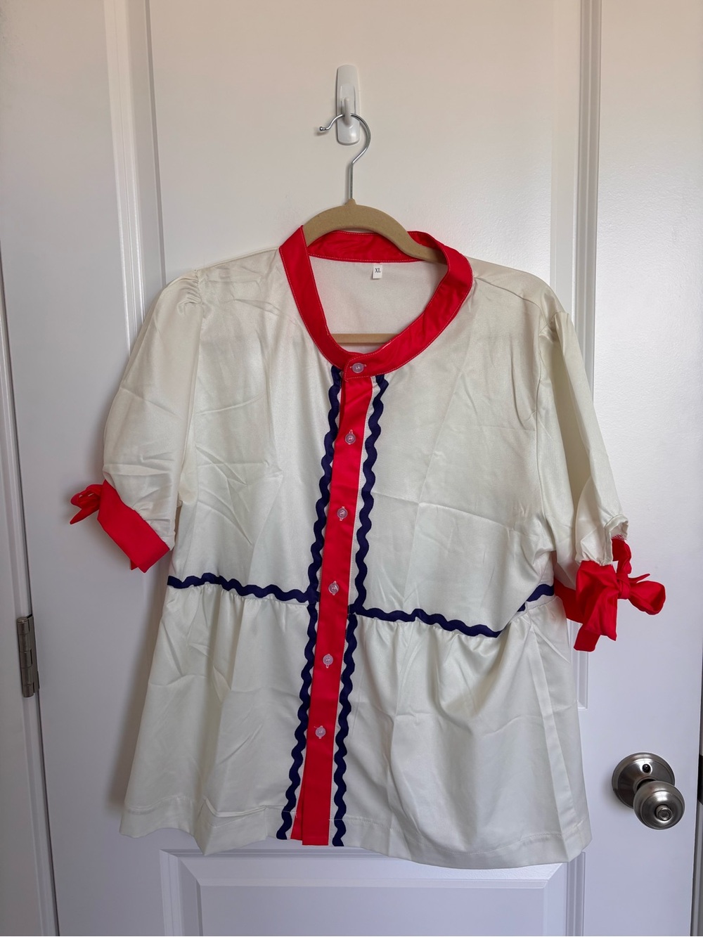 Boutique Ivory Peplum Top with Red Trim and Navy Rickrack